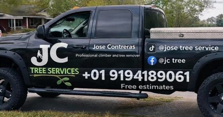 Black JC Tree Services pickup truck with the company logo, Jose Contreras' name and free estimates lettering
